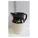 Stoneware pitcher, brown over white, marked R.R.P.