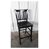 Counter Stool black color. Shows use wear in