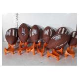 7 Footballs with 13 Kicking Tees. NFL punt, Pass
