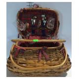 Wicker picnic basket with some plates, glasses, &