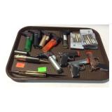 Tray with various lighters, two knives, and four