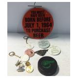 Baltimore clippers hockey puck, buttons, and pins