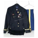 Two piece military uniform with pins and