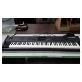 Roland A-90 Electric Keyboard. Note we plugged in