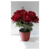 Artificial floral arrangement in wicker planter