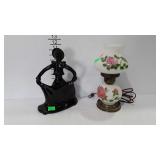 Ceramic matador statue, and vanity lamp with rose