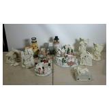 Party Lite figures and houses, 12 in all.