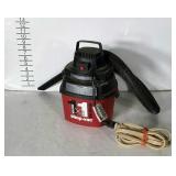 One gallon shop-vac with extention cord. Tested,