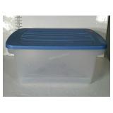 Clear tote with blue lid. 22"×17"×12"