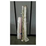 Four partial tolls of assorted textiles.