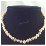 Freshwater pearl peach necklace 18in stainless