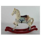 Wooden rocking horse, has crack in leg and