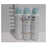 Three cans of Dove cotton soft moisturizing