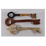 Wooden wall mount keys.