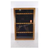 Glass display case, does have some damage.