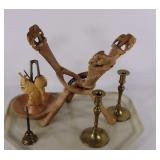 Wood decor, candle holders, and a bell.