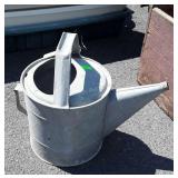 Galvanized water can