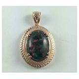 5.1ct matrix thulite malachite halo pendant in