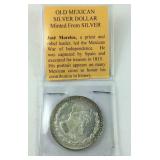 Old Mexican silver dollar