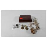 Small wooden jewelry box with necklace, earrings,