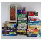 Group of 27 jigsaw puzzles, most are 500-1000