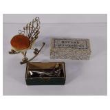 Sewing attachments and pin cushion.