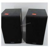 Two Polk Audio speakers