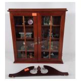 Glass display case, top piece is broken off.