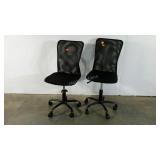 Two mesh backed office chairs, adjustable on