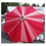 Two Outdoor Umbrellas, red fabric, both used sun