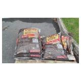 4 Bags of Brown Mulch and you can take the wood