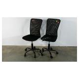 Two mesh backed office chairs, adjustable on