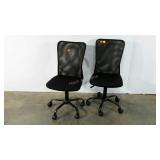 Two mesh backed office chairs, adjustable on