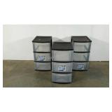 Three Sterilite plastic bin storage towers