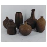 Six small Asian style pottery vases