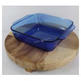 Wood pedestal and glass Pyrex casserole dish