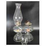 Glassware, two oil lamps and chimneys