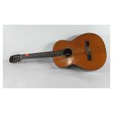 Wooden acoustic guitar, needs restrung