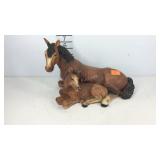 Plastic horse figurine marked 1988 baby horse has