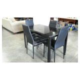 Dining table and four chairs, 28 x 47, tempered
