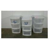 Three Sterilite plastic storage bin towers