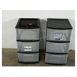 Two plastic storage bin towers