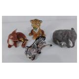 Four Porcelain animal figurines, WWF authorized