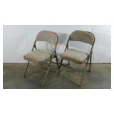 Two Samsonite folding chairs and a card table,