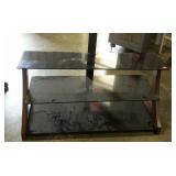 Three tiered dark glass TV stand, mounting