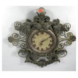 Bombay Company wall clock, 25x25, pendulum is