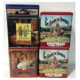 Advertising tins, four are Redman and one is