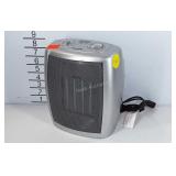 DeLonghi safe heat heater, works, 7" × 9". Seller