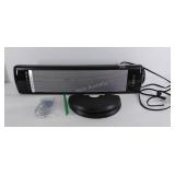 Lasko ceramic tower heater, still in box, appears