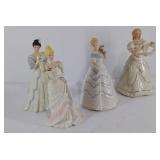 Four Lenox figurines, each approximately 8.5"